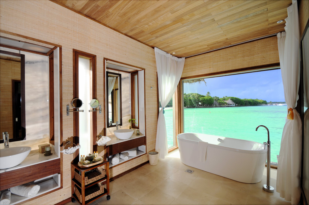 overwater bungalow bathroom with view